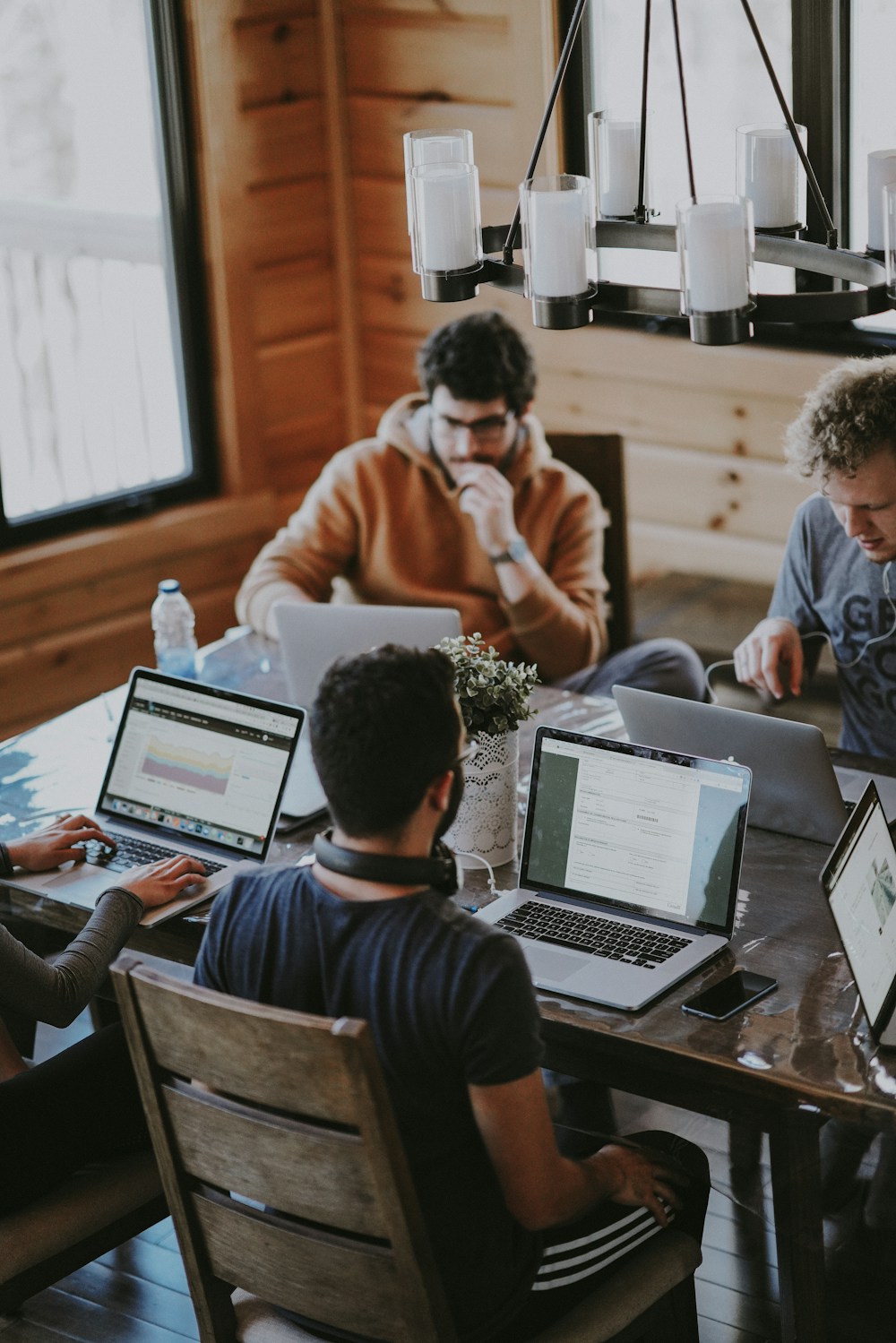 Colleagues working together around a table